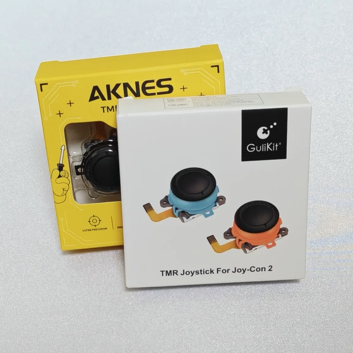 GuliKit版とAKNES版のTMRジョイスティックのパッケージ
